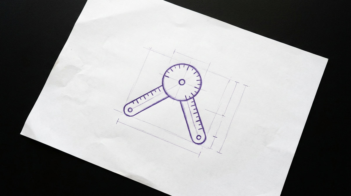 a clinical goniometer with two pivoting, ruler-like arms extending from a central, circular protractor marked with degrees