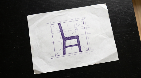 a simple, armless, straight-backed chair as used in a clinical sit-to-stand test