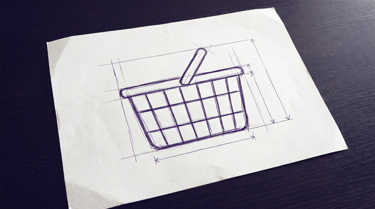 a handheld wire grocery shopping basket featuring an open rectangular grid container with a flat base and a curved carrying handle arched over the top