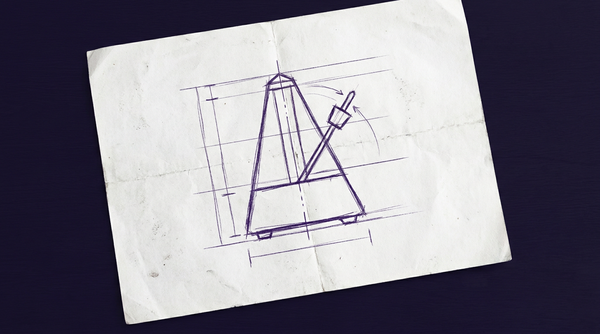 a traditional, pyramid-shaped mechanical metronome, viewed from the front, with its swinging pendulum arm and adjustable weight positioned slightly to one side of its central vertical axis to indicate motion