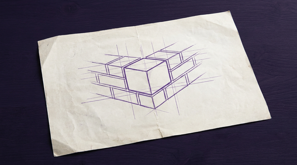 a single, solid cornerstone block, shown set in place at the ninety-degree angle junction of the lowest two courses of bricks in a wall, symbolizing a foundational element