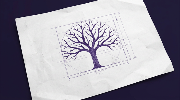 a leafless deciduous tree, viewed in silhouette, showing its trunk dividing into a complex, branching network of limbs and smaller twigs, with the overall structure resembling a root system in reverse