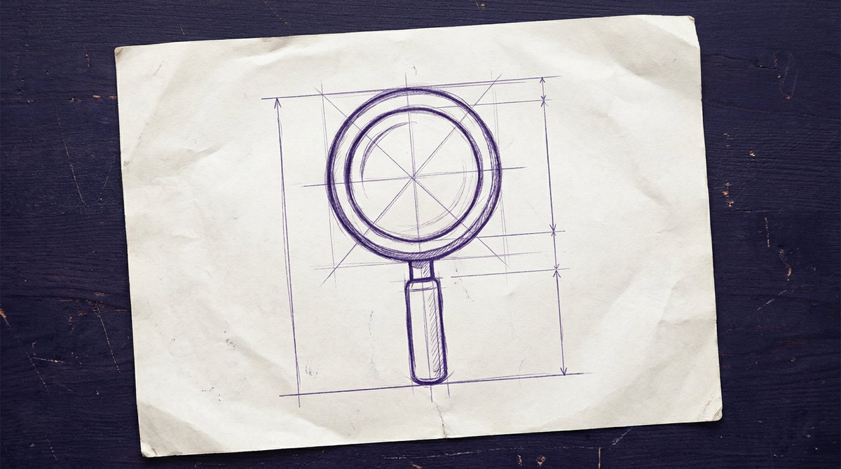 a classic handheld magnifying glass, consisting of a circular lens set in a round frame with a short, straight handle extending from the bottom