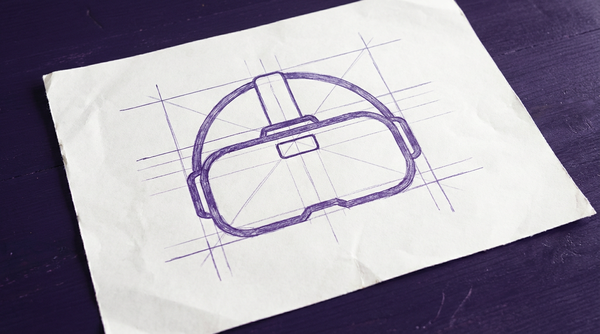 a virtual reality headset, viewed from the front, comprised of a main goggle-like visor and an overhead head strap