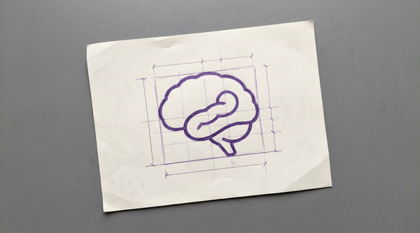 a stylized profile view of a human brain, with the temporal lobe clearly delineated