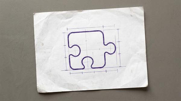 a single jigsaw puzzle piece, of the standard interlocking type with one tab extending outward and one indentation for receiving a tab
