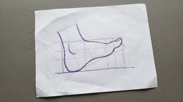 a simple, stylized human foot, viewed from the side in profile, with the heel on a flat ground line and the toe slightly lifted