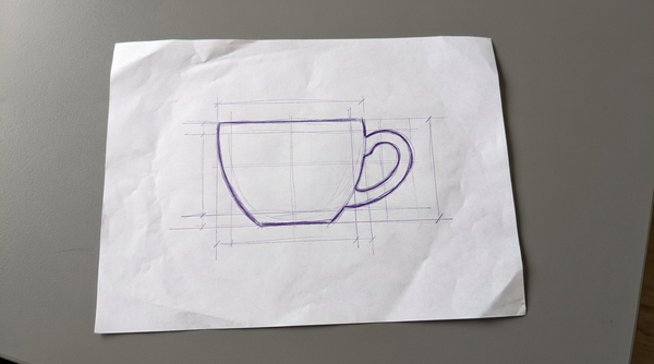 a teacup, viewed from the side, with a prominent C-shaped handle